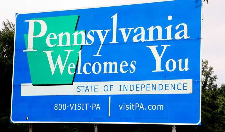 A sign in Pennsylvania welcoming people