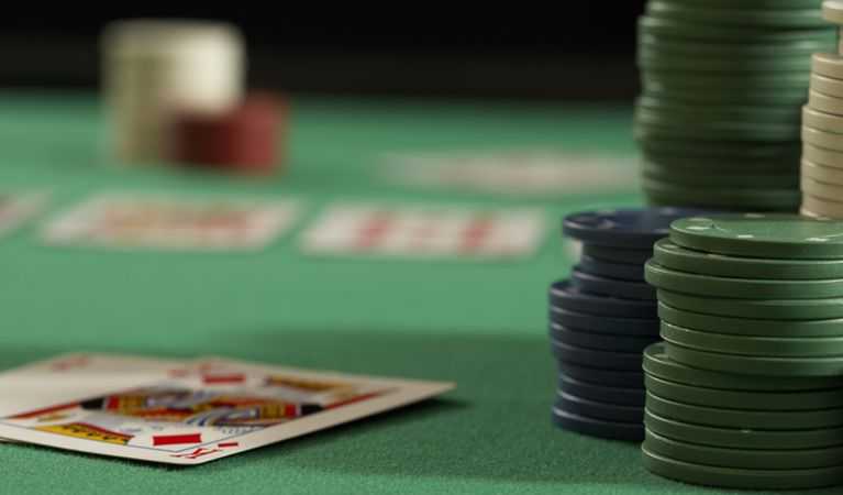 Poker chips, felt, and cards