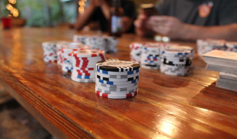 Poker chips at a table.