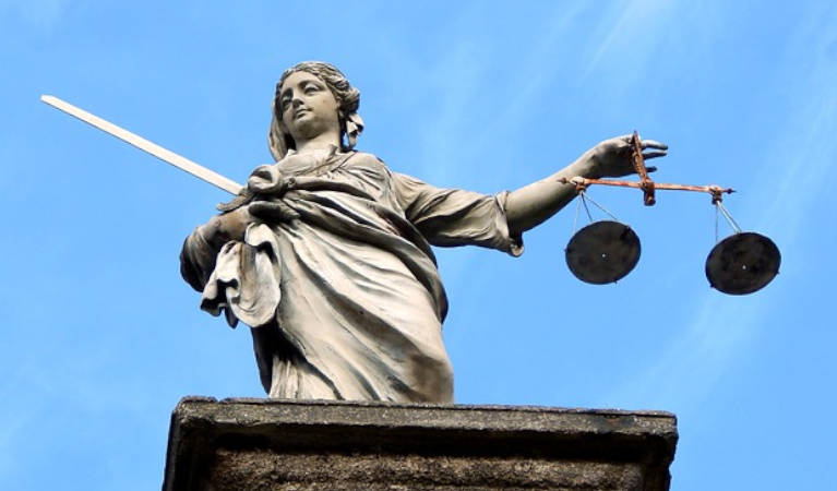 The picture represents a statue of lady justice in Dublin.