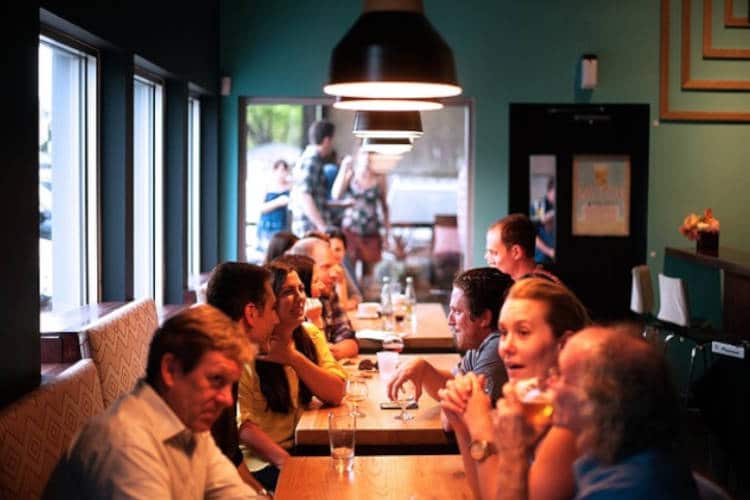 People at a table in a restaurant.